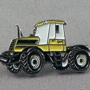 YELLOW TRACTOR PIN BADGE